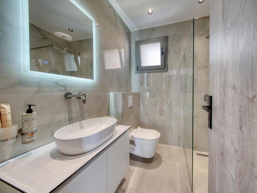 Bathroom with a walk-in rainfall shower