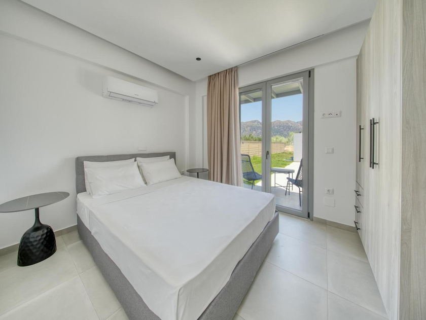 Double bedroom with garden and mountain views