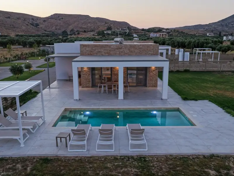 Villa and private pool in the evening light