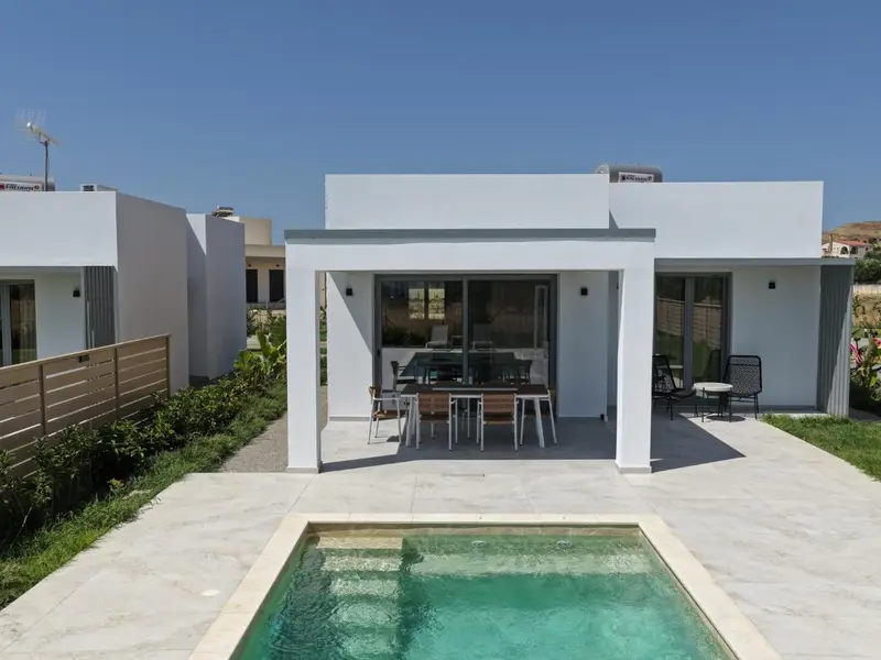 Villa exterior with the private pool in the foreground
