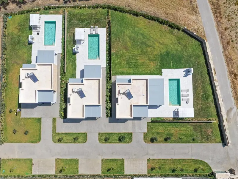 Aerial view of the three ŌNAR villas and their private pools