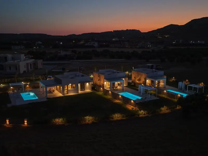 The three villas at sunset from the air
