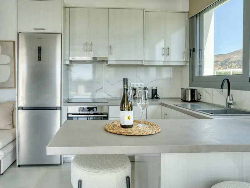 Kitchen counter with kettle, toaster and coffee maker