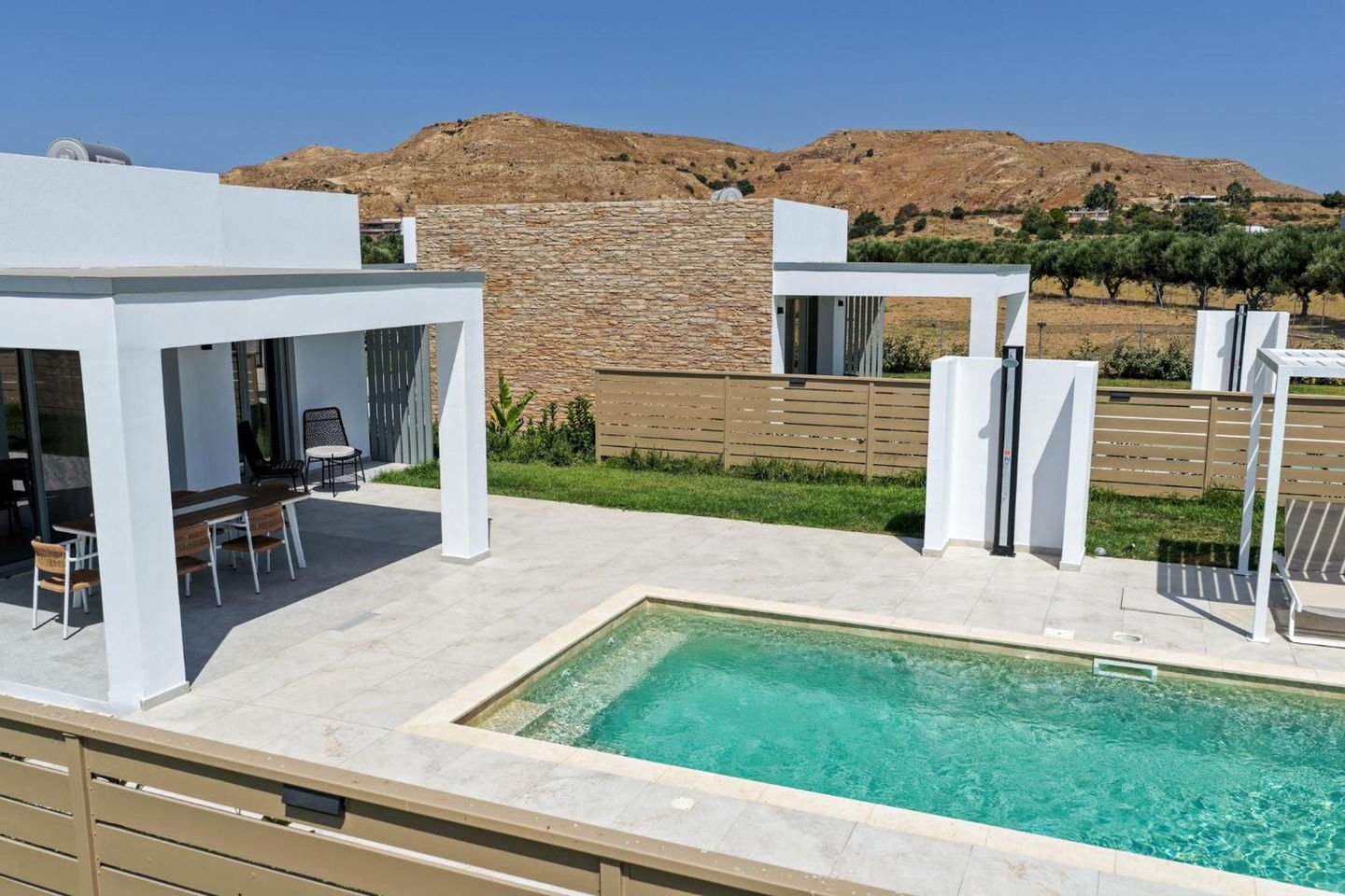 Pool terrace looking out over olive groves towards the hills